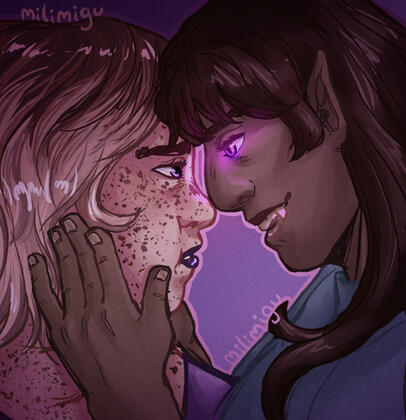 A brown skinned vampire woman holds a freckled woman&#39;s face in her hands. They both have purple eyes. The vampire&#39;s are glowing.